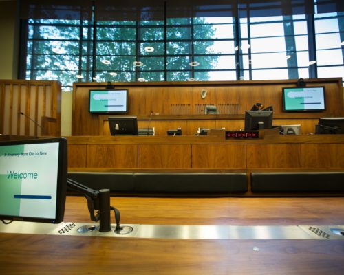 A photo of digital devices ready for use in a modern court.
